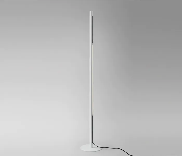 Lámpara de pie de diseño exclusiva creada por Josep Lluís Xuclà para proyectos de iluminación de calidad. Luminaria de pie fabricada en tubo de aluminio cortado a láser con iluminación indirecta: luz ambiental hacia la pared y luz focal hacia el techo. Incorpora dos potenciómetros integrados para el control independiente de cada fuente de luz. Lámpara de pie de diseño contemporáneo ideal para iluminación decorativa en hoteles, interiores residenciales y contract. Perfecta para ambientación arquitectónica, iluminación de hotel, iluminación técnica de diseño, iluminación de diseñador y proyectos de lighting design sofisticados – Insolit BCN Lighting Exclusive designer floor lamp by Josep Lluís Xuclà, crafted from laser-cut aluminum tube with dual indirect lighting: ambient wall light and focused upward ceiling light. Features two integrated dimmers for independent control of each light source. A contemporary floor lamp ideal for high-end lighting design, hotel lighting, designer lighting, and architectural interiors. Perfect for decorative lighting in residential and contract spaces, providing atmosphere and premium lighting quality – Insolit BCN Lighting"