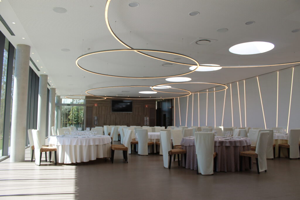 big circular design lamps in restaurant, made in barcelona by insolit