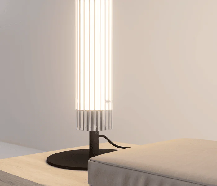 Luminaria de diseño de pie Glass, diseñada por Josep Lluís Xuclà para Insòlit, destaca por su luz envolvente y presencia imponente. Fabricada con tubo de cristal estriado que crea una iluminación difusa de cristal y un efecto luminoso flotante, esta lámpara de pie aporta elegancia y sofisticación a cualquier espacio. El cuerpo está hecho en tubo de acero resistente y cuenta con un LED en PCB diseñado por Insòlit, que ofrece una iluminación de calidad y eficiente. La luminaria Glass es regulable en altura mediante dos cables de acero inoxidable y tiene un florón independiente para instalación en superficie, siendo totalmente personalizable para proyectos de iluminación de diseño, iluminación personalizada, iluminación de lujo, iluminación a medida, lighting design y lámpara de pie. Ideal para ambientes residenciales, iluminación de cocina y locales comerciales que buscan una lámpara de pie de diseño exclusivo y alta gama, Glass representa la excelencia en iluminación de suspensión, lamparas de diseño, luxury lighting y productos premium de Insòlit, convirtiéndose en el punto focal que eleva la estética y funcionalidad del espacio. Glass floor lamp, designed by Josep Lluís Xuclà for Insòlit, stands out for its immersive light and striking presence. Made with ribbed glass tubing that creates diffuse crystal lighting and a floating luminous effect, this floor lamp adds elegance and sophistication to any space. The body is crafted from durable steel tubing and features an LED PCB designed by Insòlit, providing high-quality, efficient lighting. The Glass lamp is height-adjustable with two stainless steel cables and includes an independent canopy for surface installation, making it fully customizable for lighting design, personalized lighting, luxury lighting, bespoke lighting, suspension lighting, and floor lamp projects. Perfect for residential settings, kitchen lighting, and commercial spaces seeking an exclusive, high-end floor lamp, Glass exemplifies excellence in designer lamps, luxury lighting, suspension lighting, and premium Insòlit products, becoming the focal point that enhances space aesthetics and functionality. Glass tamble, table lamp, lámpara de mesa.